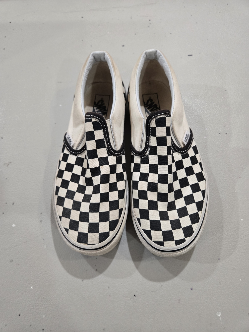 Vans Kids Checkerboard Slip-On Sneakers in Black and White